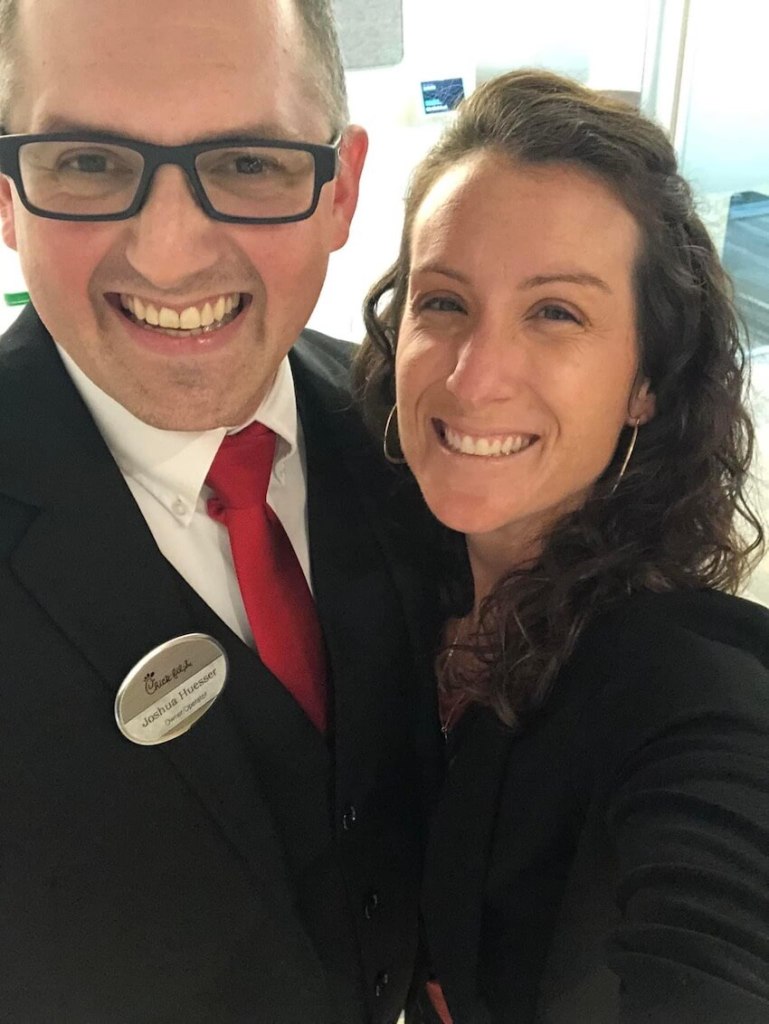 A couple smiling in a selfie.