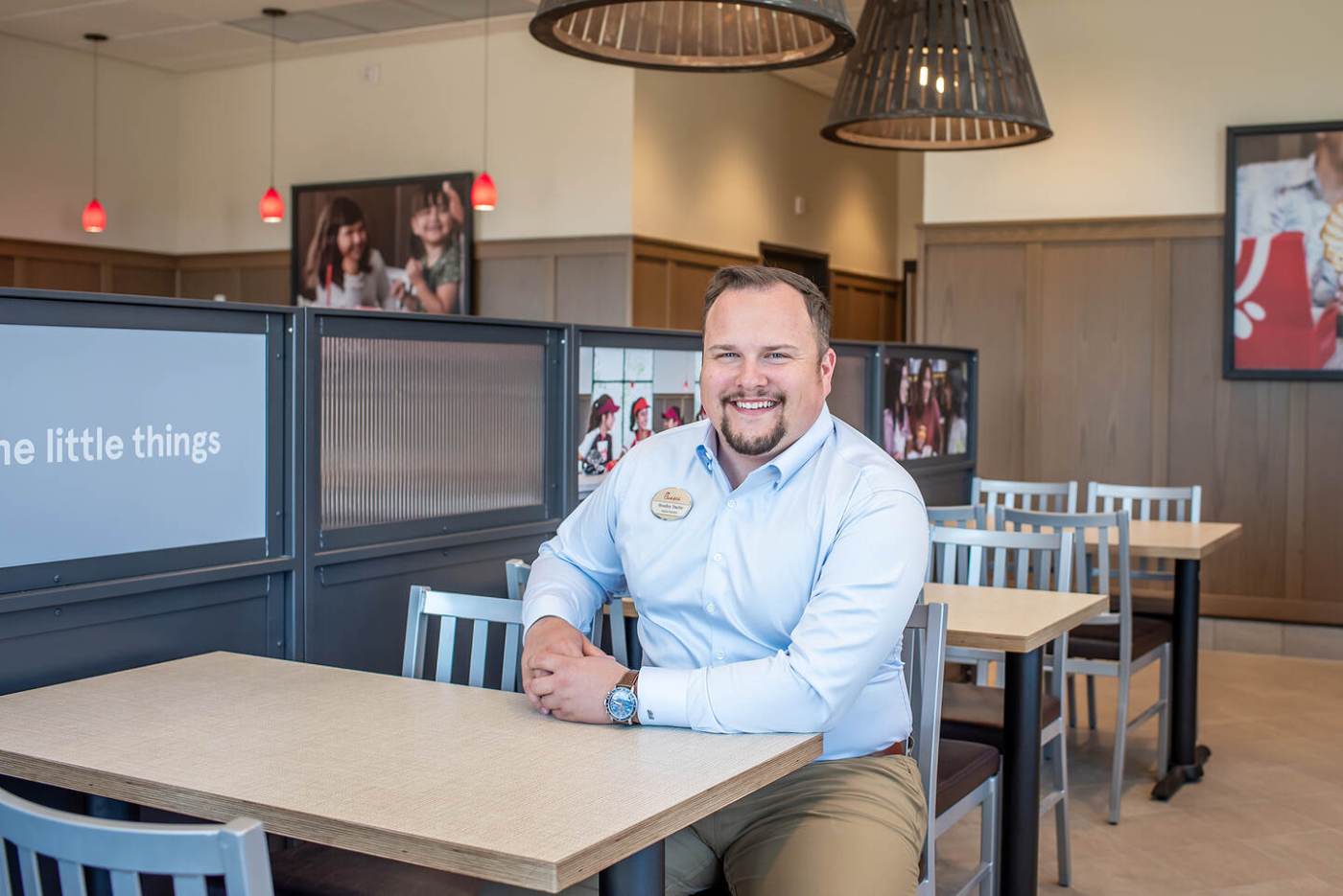 Bradley Bache at a table inside of Chick-fil-A.