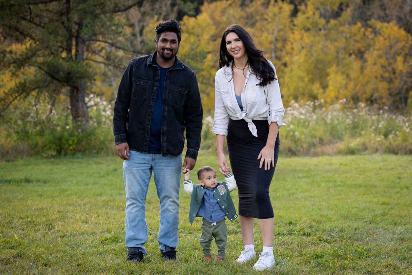 Karleen Rhodes and her family outdoors.