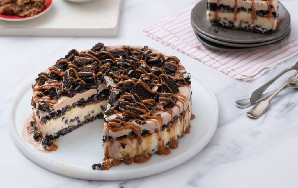 Layered Ice Cream Cake cookies and caramel sauce.