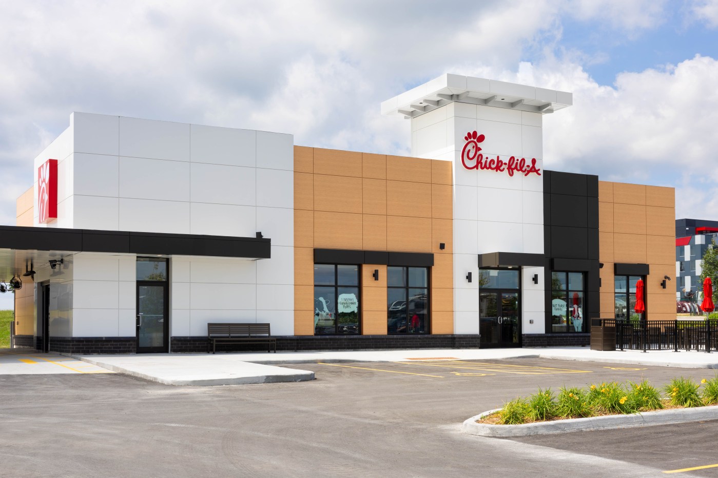Photo of the exterior of a Chick fil-A Restaurant during the Day